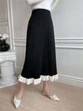 OME Two Tone Ruffle Hem Knit Skirt