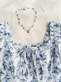 Front Tie Short Sleeve Allover Print Casual Top